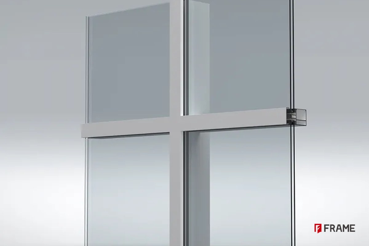 3D cutaway of the curtain wall frame showing mullion, transom and glazing pocket structure