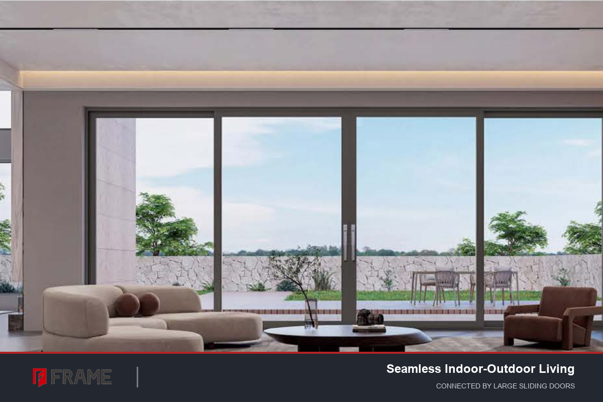 Sunroom connected to living room through large aluminum sliding doors